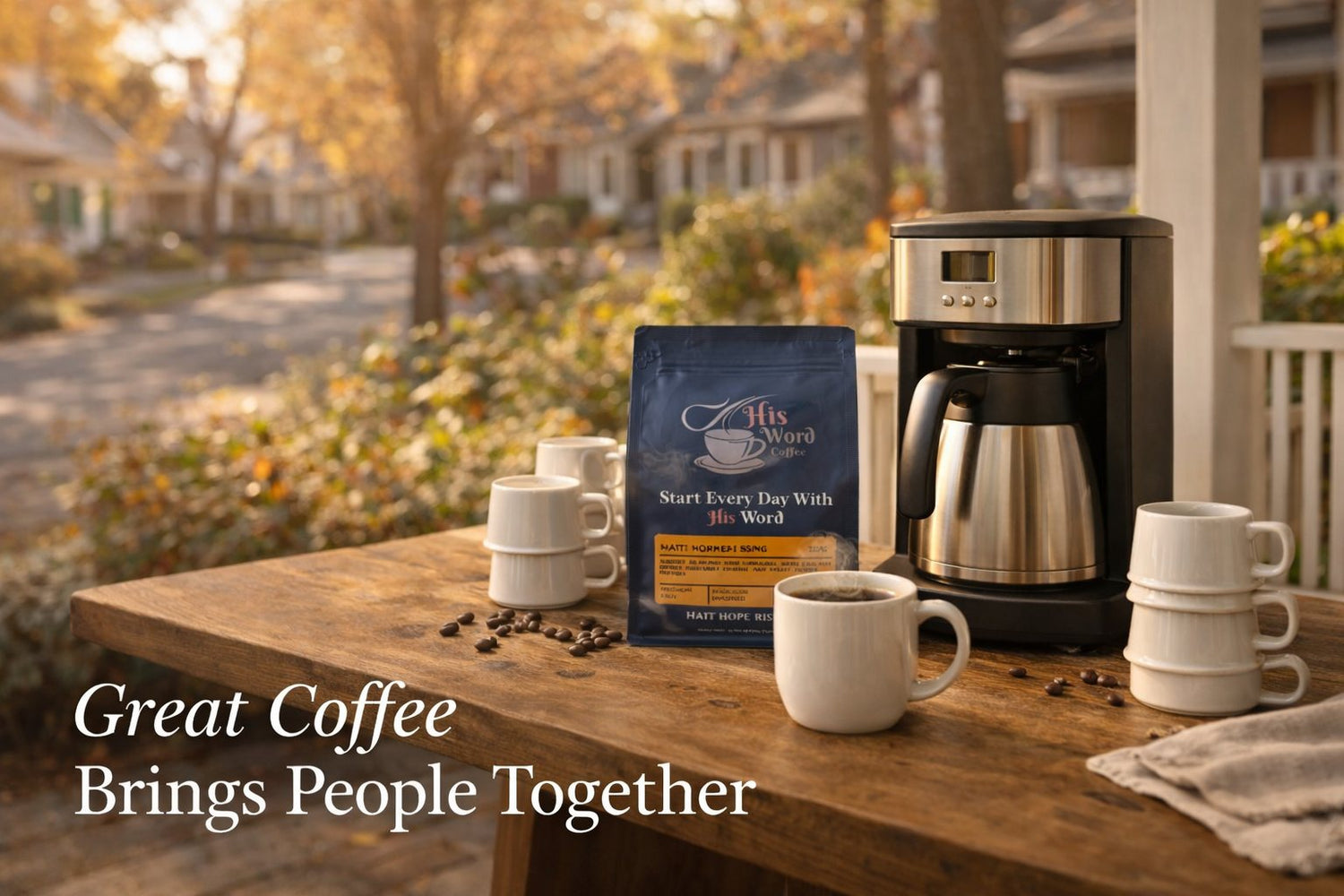 His Word Coffee bag on an outdoor porch table with mugs and coffee maker among autumn leaves - His Word Coffee