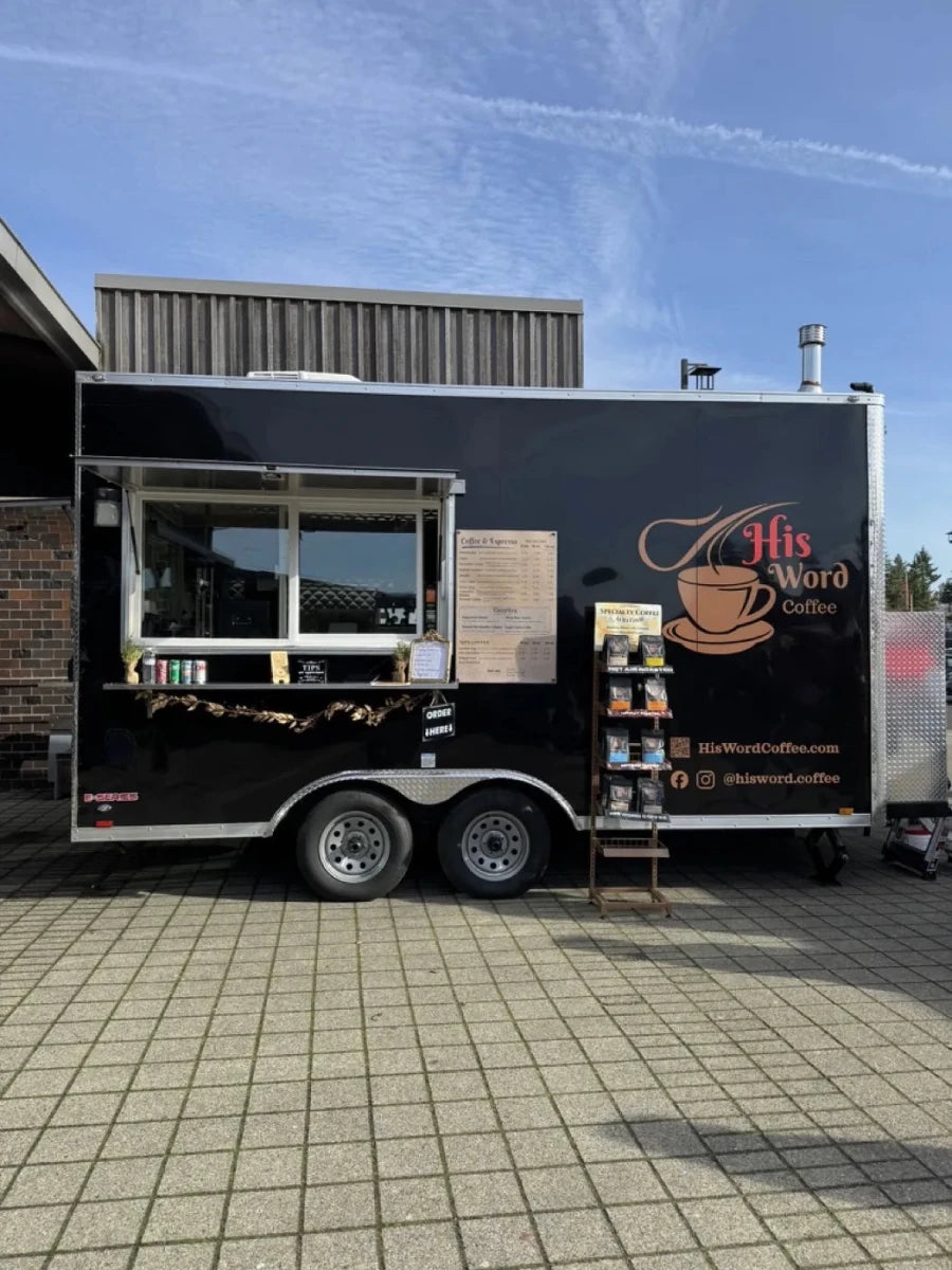 His Word Coffee mobile espresso trailer set up outdoors and ready to serve your event